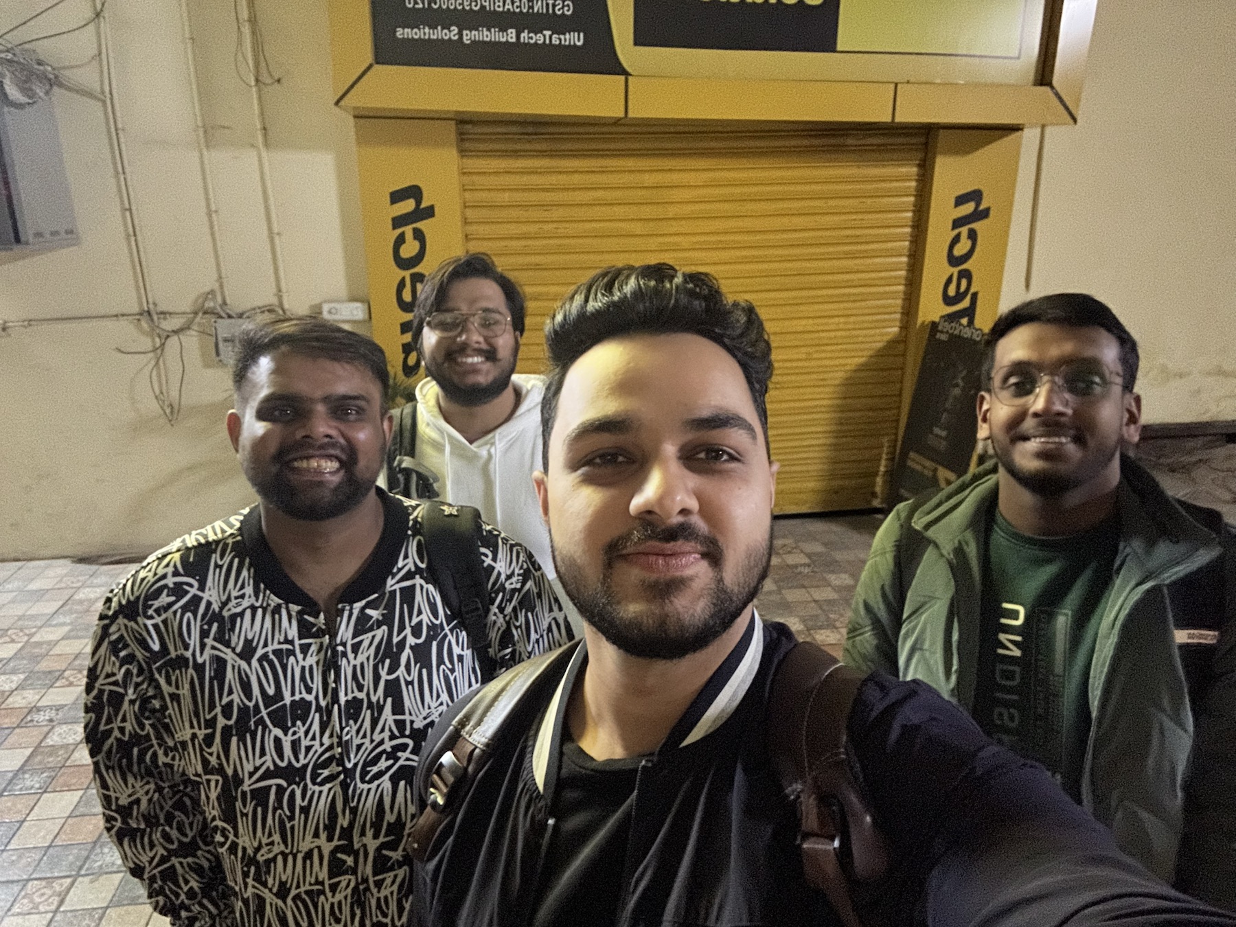DigiStay's first four founding members together at night.