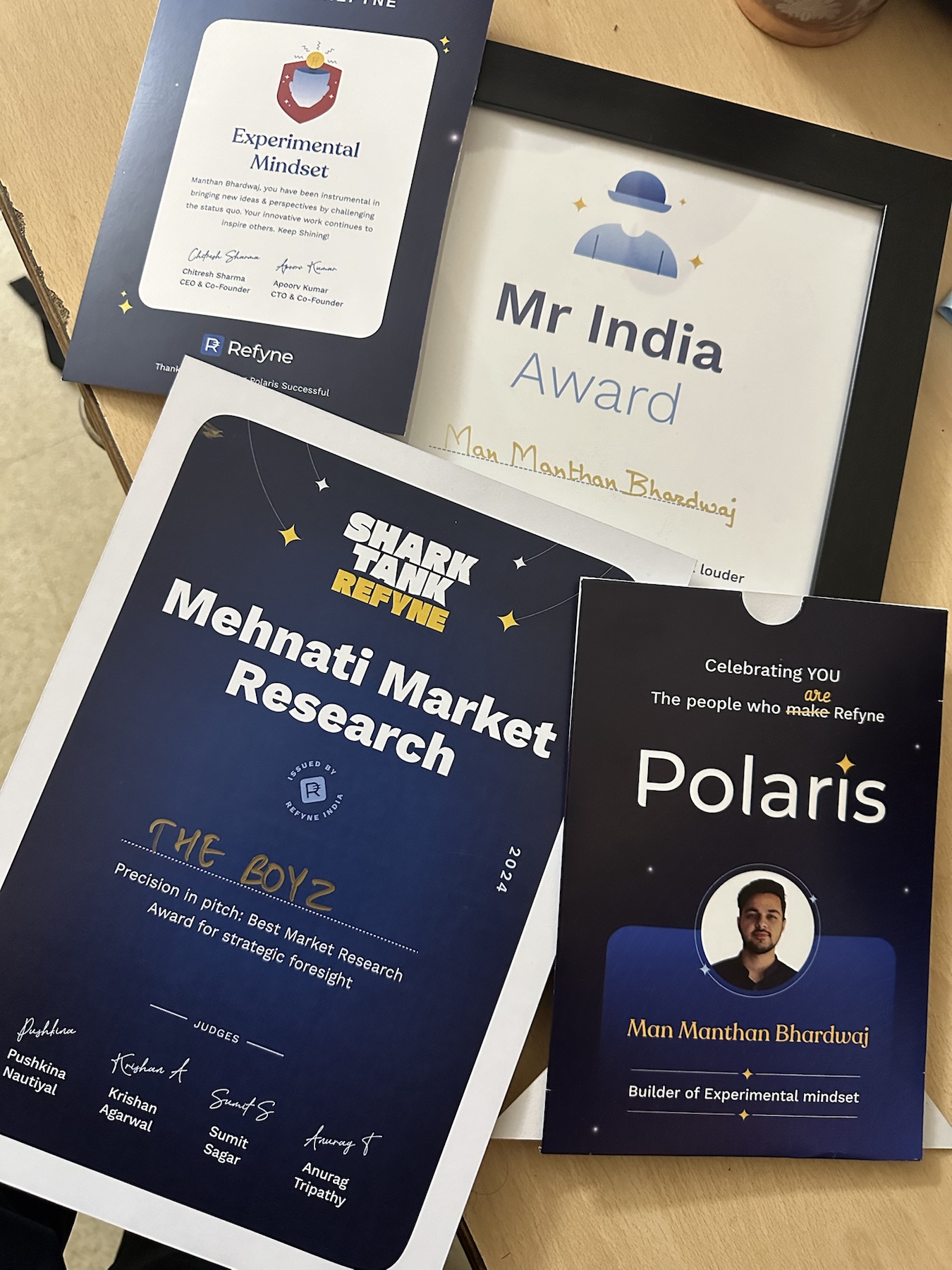 Refyne award certificates addressed to Manthan Bhardwaj.