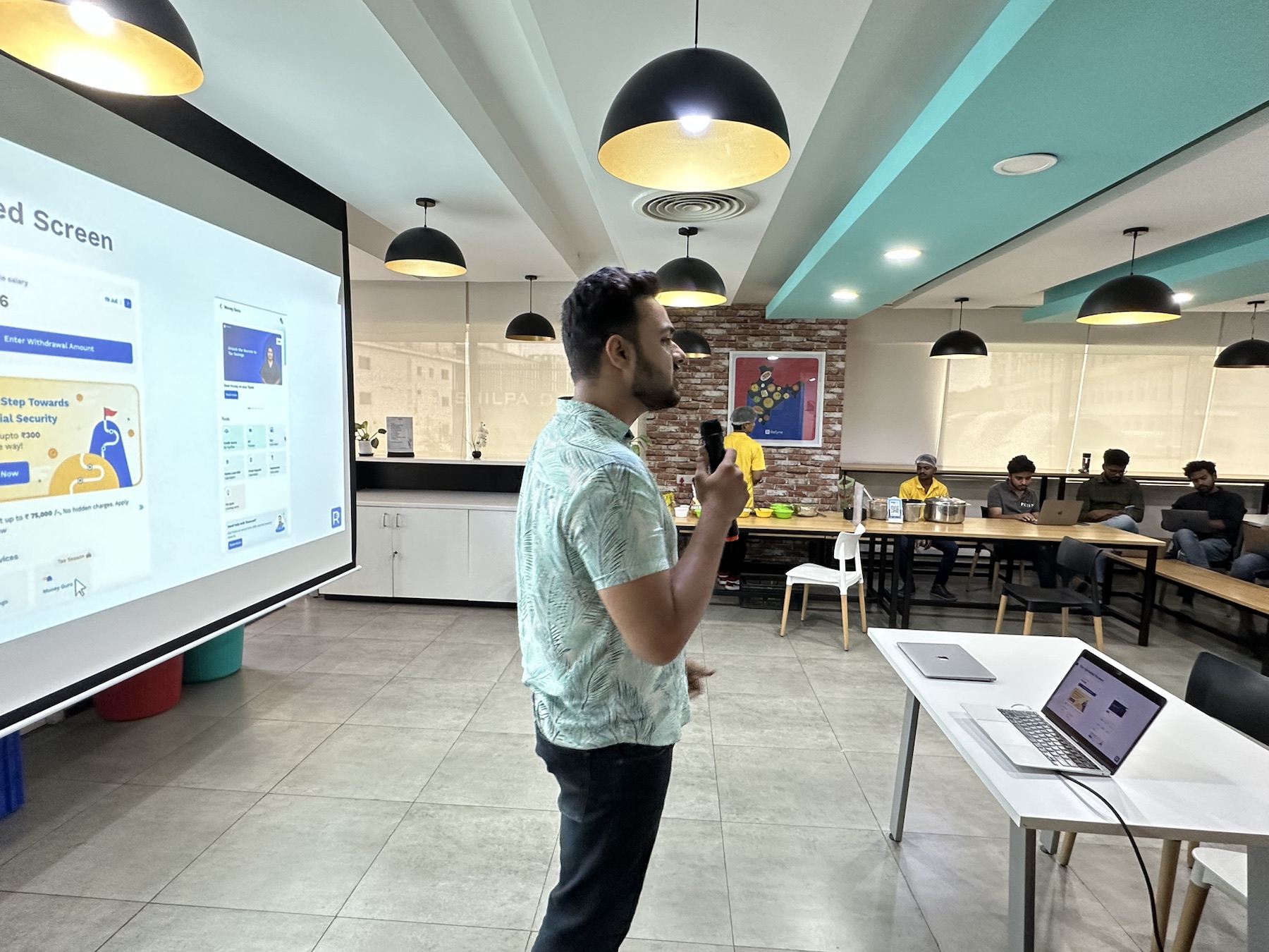 Manthan presenting Refyne's financial-wellness impact.